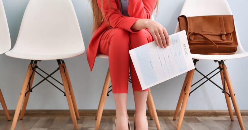 Woman Waiting with a Resume